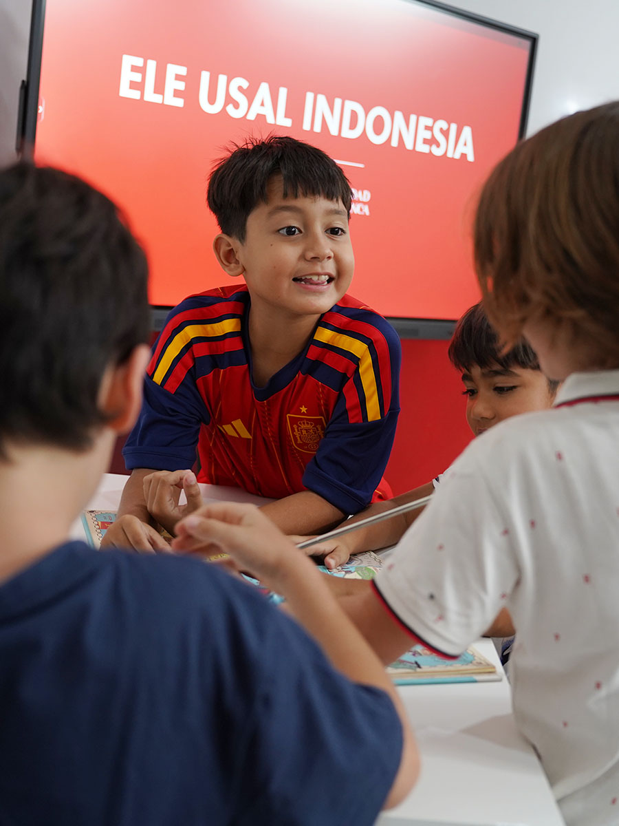 Teenagers developing their Spanish communication skills in class